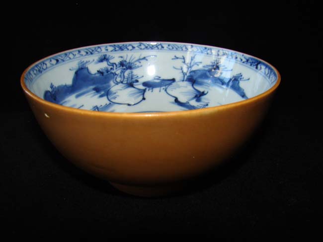 NANKING CARGO brown glaze bowl with blue and white river scene interior circa 1750